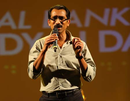 M.C.Roy addressing the audience during the Melody in Darkness event . 3rd Dec 2012