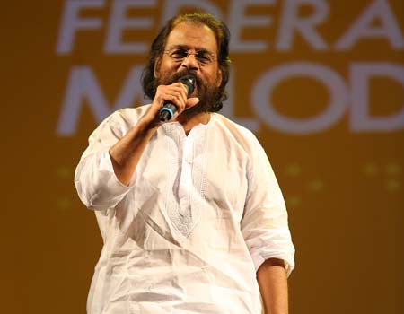 Yesudas performing at the melody in darkness concert