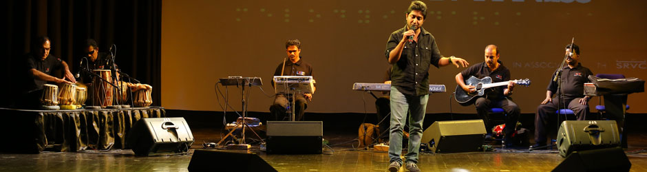 Vineeth Sreenivasan performing at the melody in darkness concert 